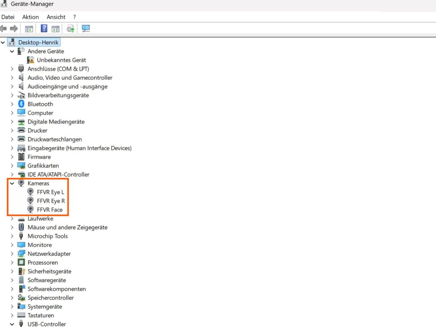 Device Manager showing three camera devices confirming successful installation