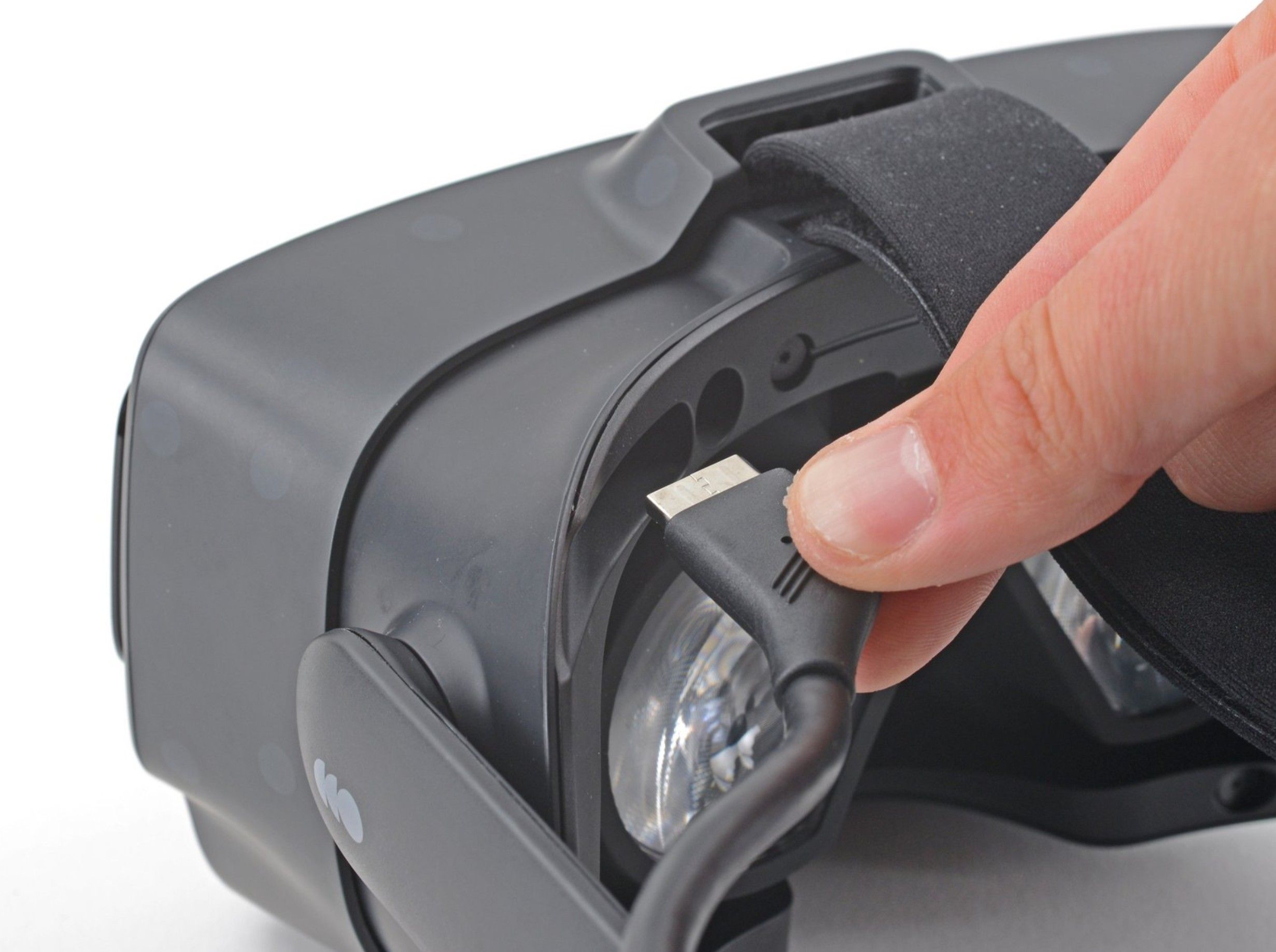 Pulling the tether cable out of the headset