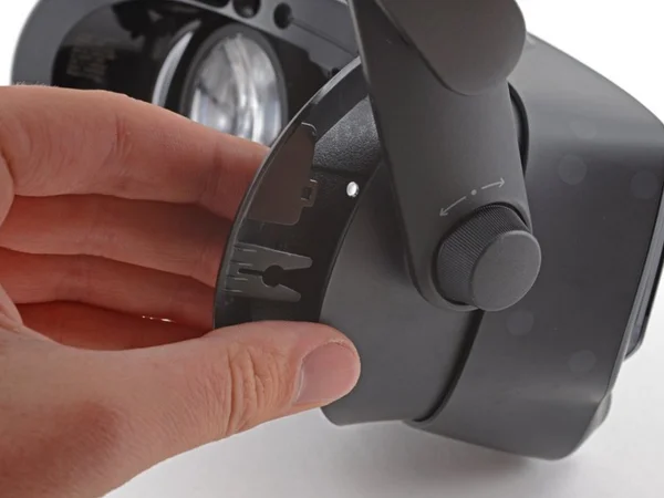 Sliding the bezel onto the headset