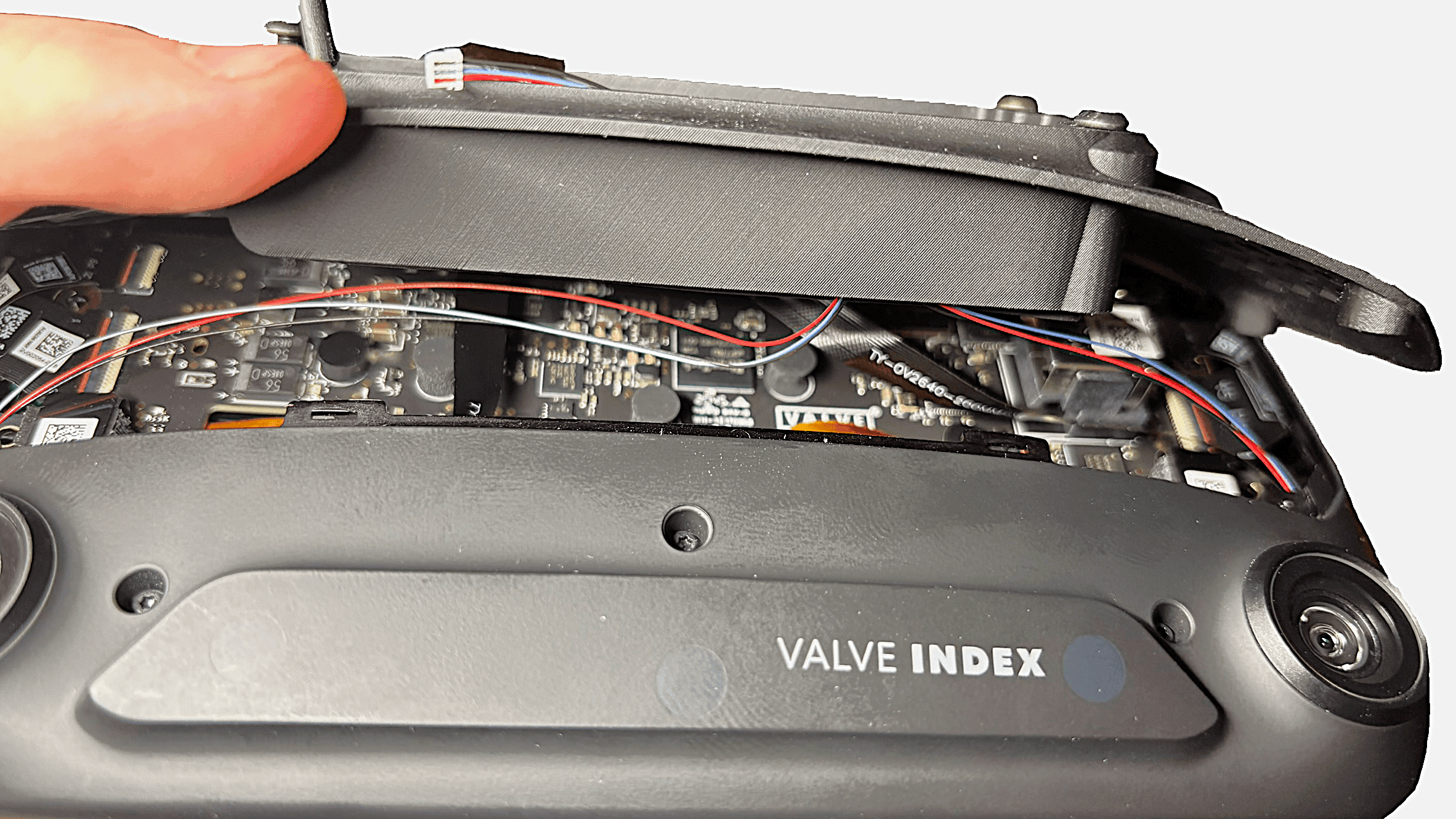 Close-up of right cable near USB port, routed away from connector