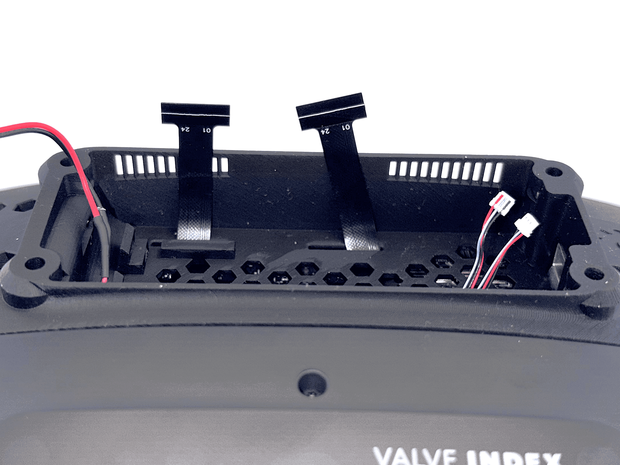 Cables extending about 1 cm beyond the frunk edge