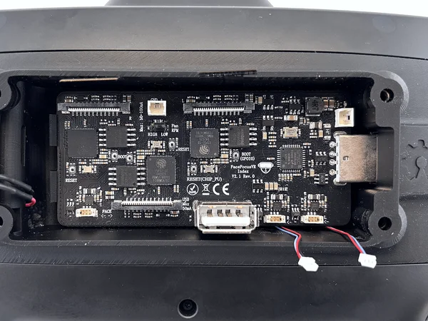Mainboard being inserted at an angle into the USB connector