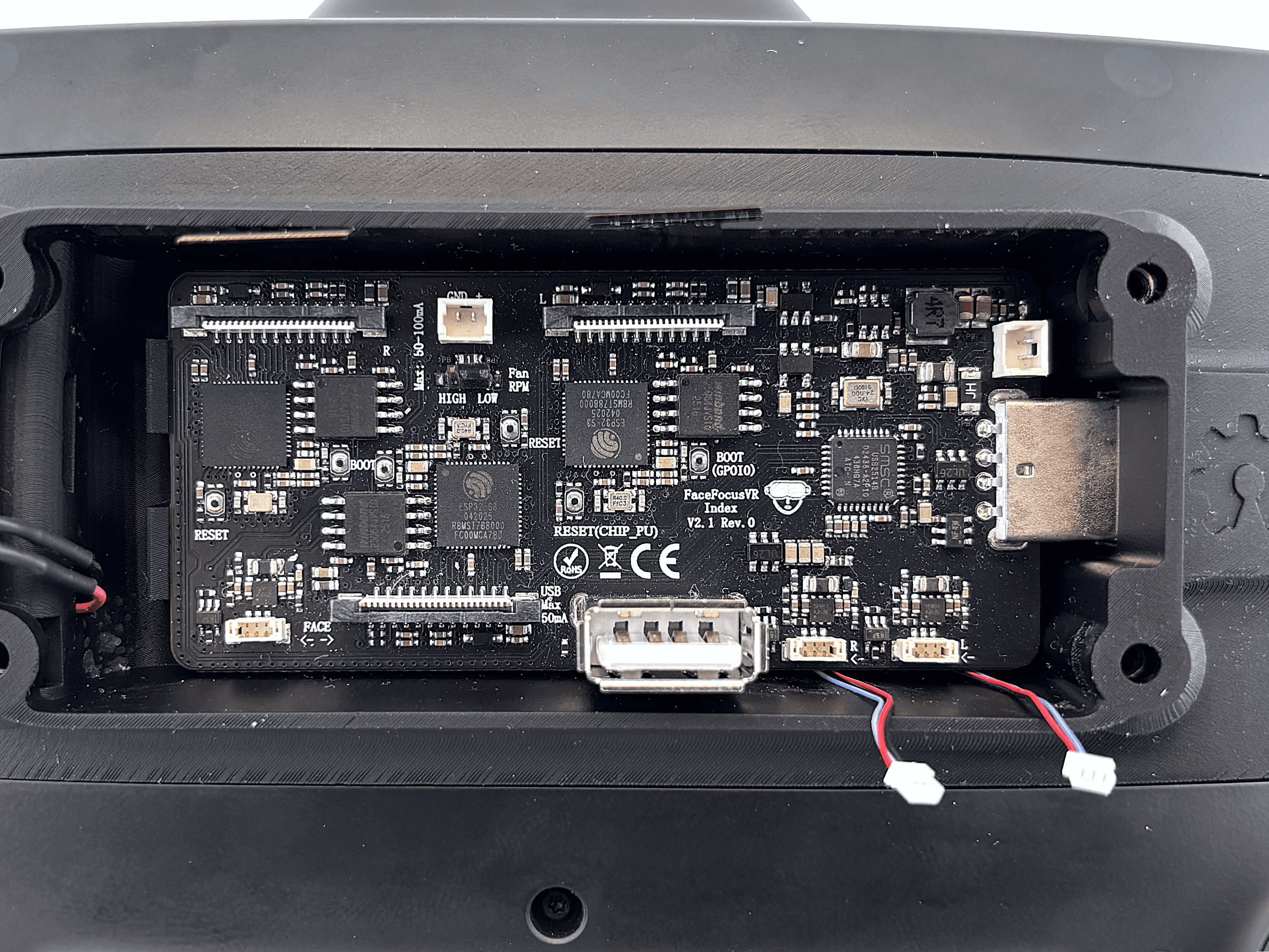 Mainboard being inserted at an angle into the USB connector