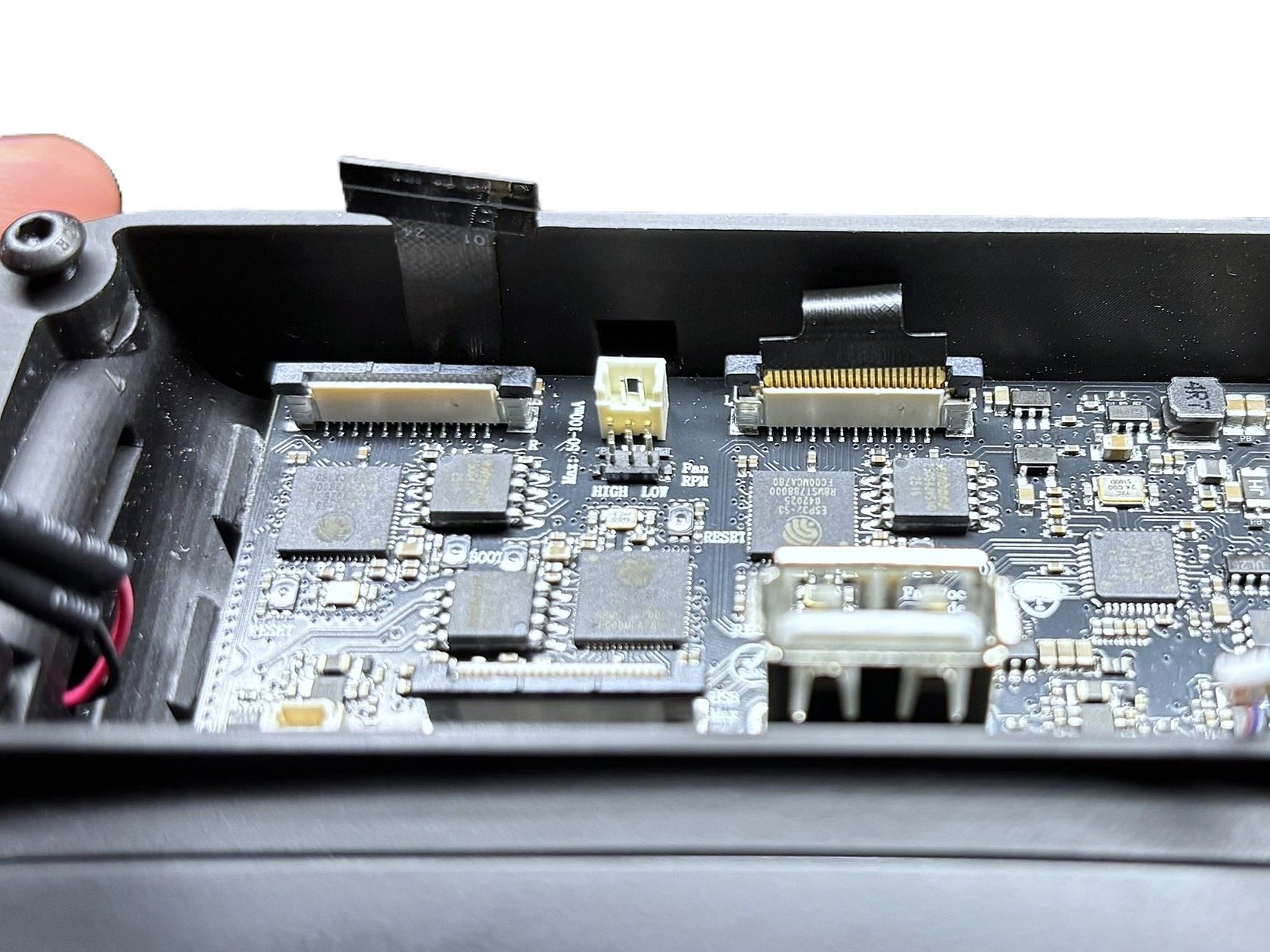 Ribbon cable gently bent and connected to the mainboard