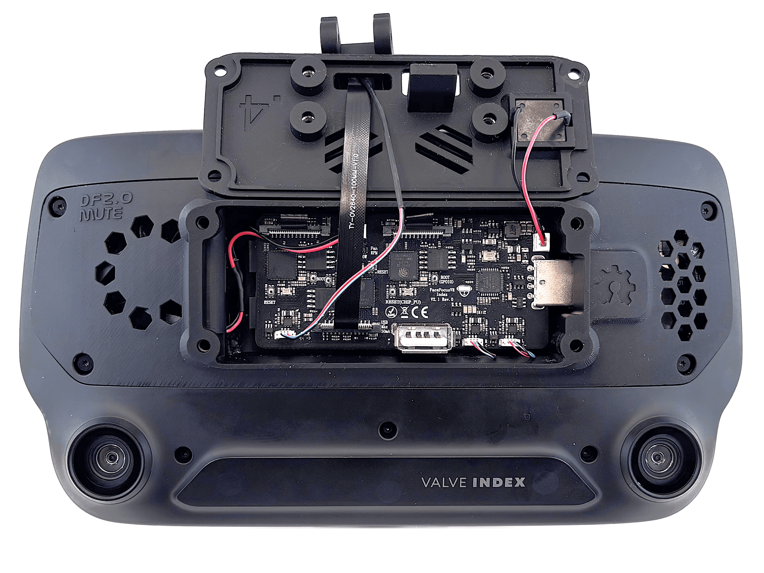 Face tracking module fed through the front cover and connected to the board