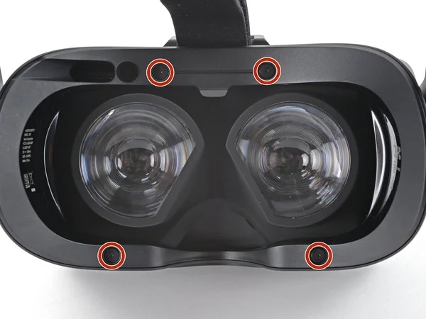 Four T5 Torx screws highlighted on the headset