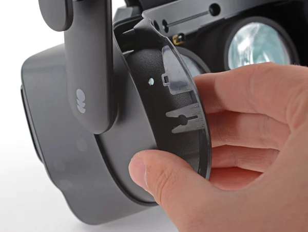 Sliding the left side of the bezel off