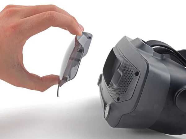 Pulling the magnetic front cover off the headset