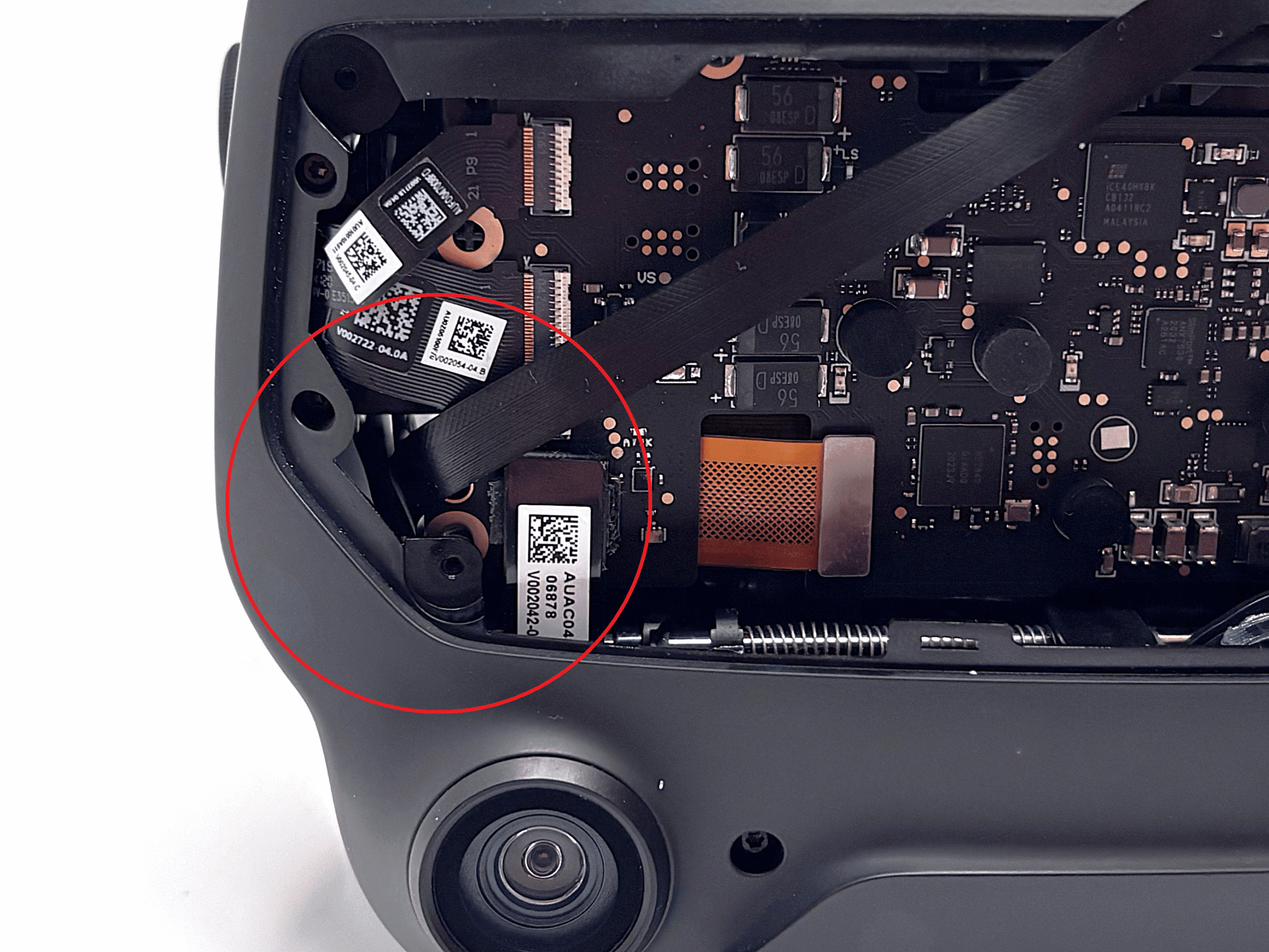 Front view with highlighted area where the right cable exits