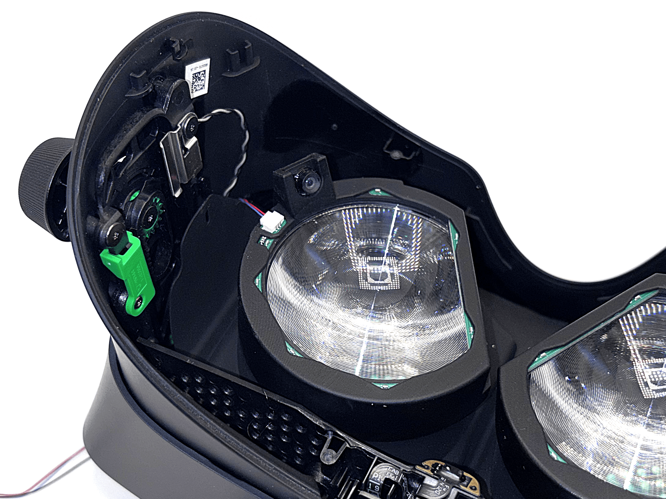 Ring pressed onto lens with excess cable pulled through